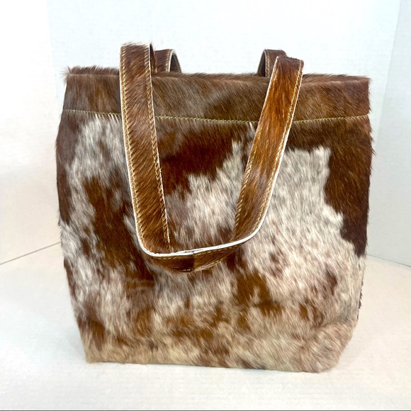 Urban Outfitters Handbags - PRICE FIRM! Urban Outfitters Calf Hair Tote Bag Brown/White GREAT GIFT!